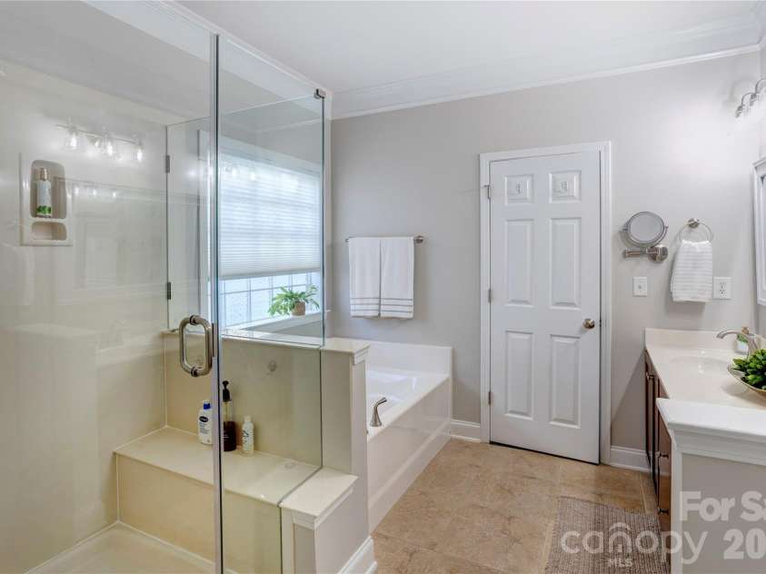 2663 Danbury Circle, Concord, NC 28027.  MLS# CAR4394399, YatesRealty ID 12988. Luxurious primary bath.