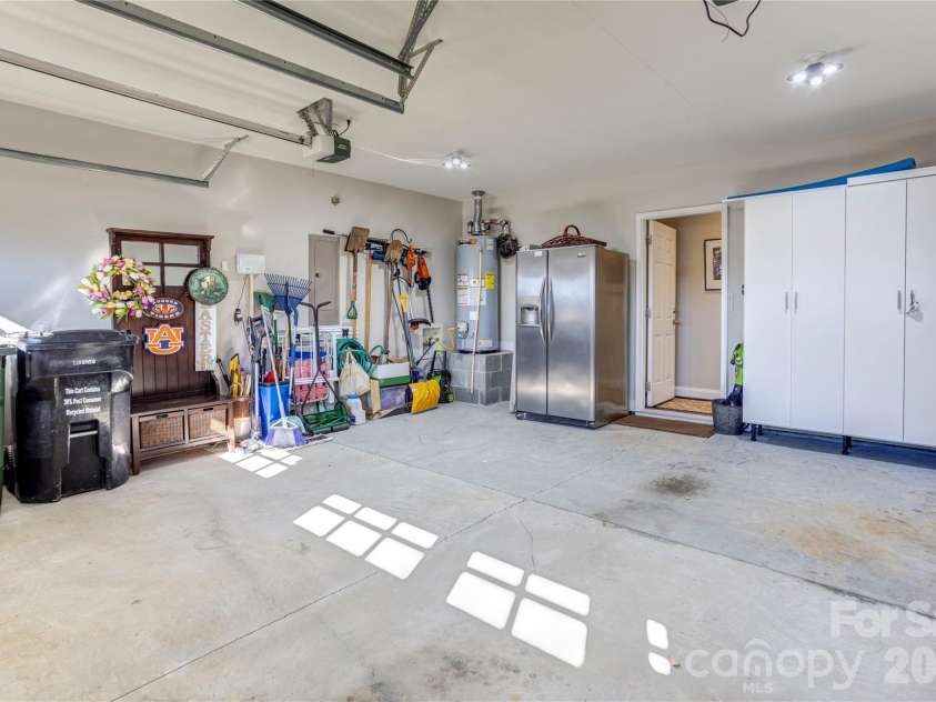 2663 Danbury Circle, Concord, NC 28027.  MLS# CAR4394399, YatesRealty ID 12988. Nice 2-car garage with more built-in cabinets.