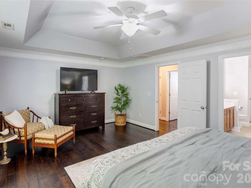 2663 Danbury Circle, Concord, NC 28027.  MLS# CAR4394399, YatesRealty ID 12988. The tray ceiling makes the primary feel even more spacious.