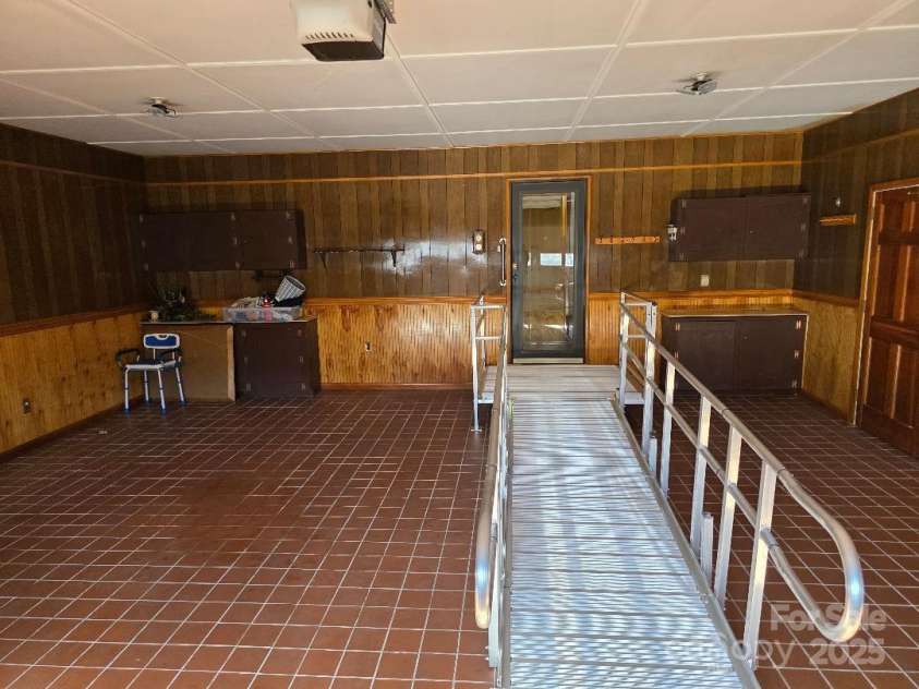 1375 US Highway 19E Highway, Burnsville, NC 28714.  MLS# CAR4329254, YatesRealty ID 1299. Door from attached garage to mud room and kitchen