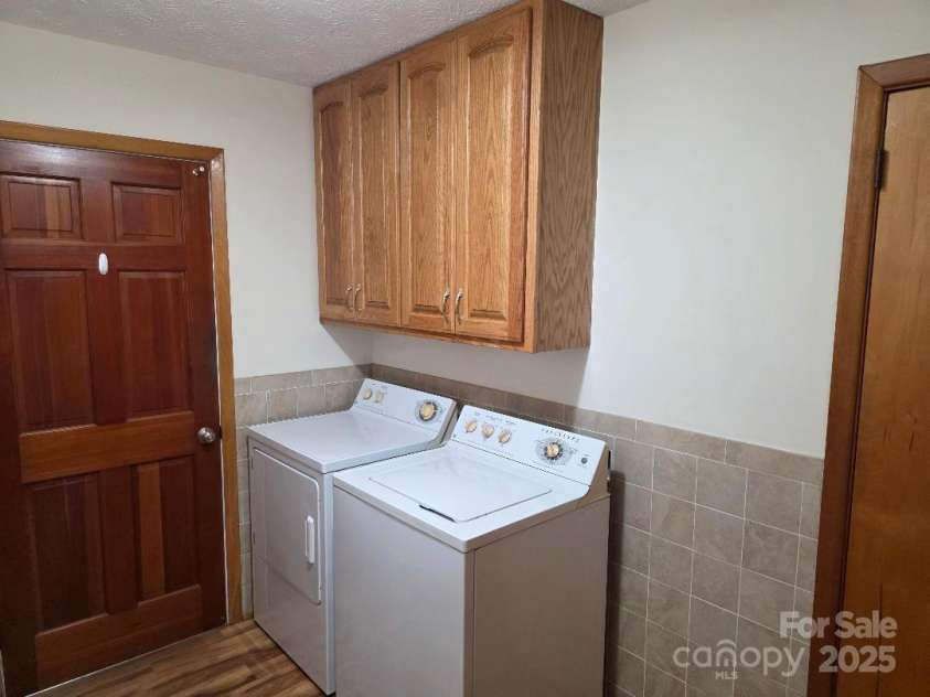 1375 US Highway 19E Highway, Burnsville, NC 28714.  MLS# CAR4329254, YatesRealty ID 1299. Laundry area