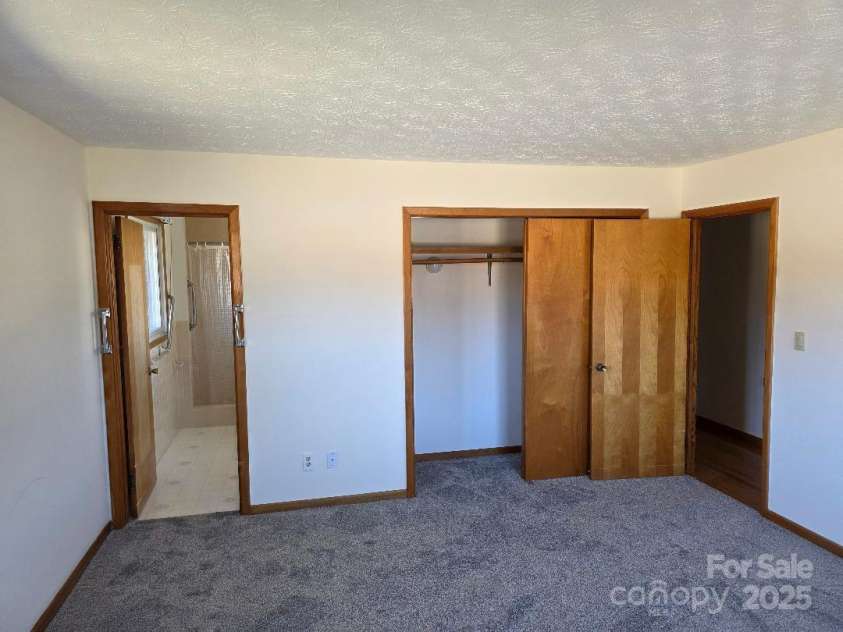 1375 US Highway 19E Highway, Burnsville, NC 28714.  MLS# CAR4329254, YatesRealty ID 1299. Primary bedroom