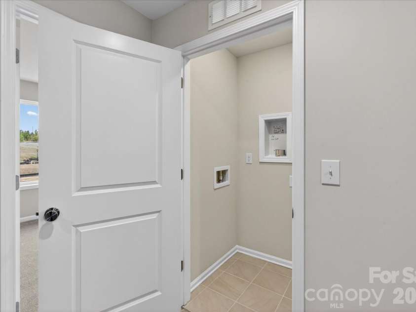 242 Ferebee Place, Charlotte, NC 28213.  MLS# CAR4322624, YatesRealty ID 1299. Laundry