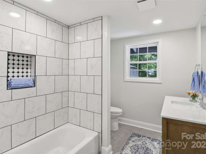 1192 Carolyn Drive, Albemarle, NC 28001.  MLS# CAR4258192, YatesRealty ID 12991. Hall Bathroom