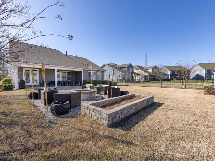 1022 Doughton Lane, Indian Trail, NC 28079.  MLS# CAR4234561, YatesRealty ID 12992. Firepit are...perfect for those chilly evenings!