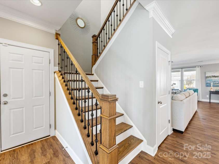 1022 Doughton Lane, Indian Trail, NC 28079.  MLS# CAR4234561, YatesRealty ID 12992. Hardwoods on stairs and metal balusters