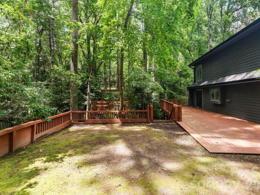 45 Windward Drive, Asheville, NC 28803.  MLS# CAR4341817, YatesRealty ID 12992. Back yard and deck