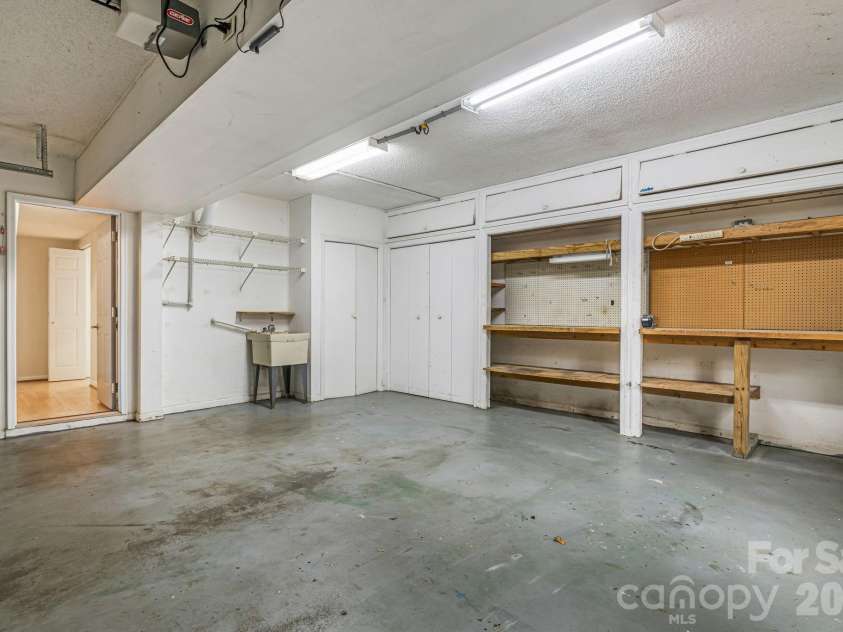 45 Windward Drive, Asheville, NC 28803.  MLS# CAR4341817, YatesRealty ID 12992. Garage Workshop space