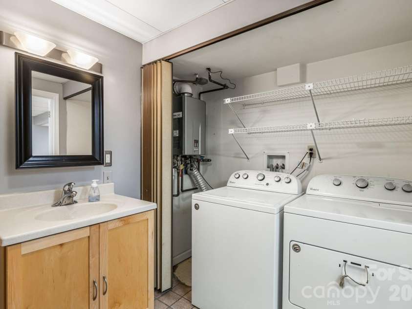 45 Windward Drive, Asheville, NC 28803.  MLS# CAR4341817, YatesRealty ID 12992. Lower level full bath and laundry