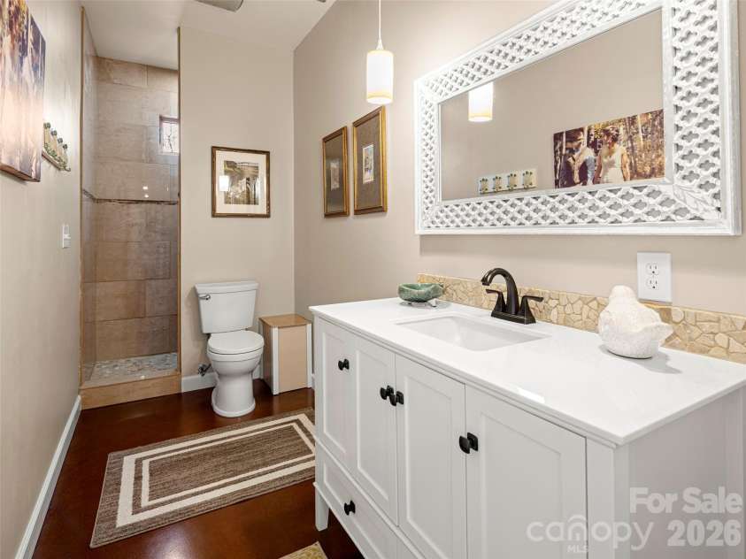9 Stegall Lane, Asheville, NC 28805.  MLS# CAR4350787, YatesRealty ID 12994. Basement level full bathroom