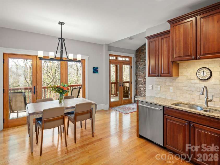 9 Stegall Lane, Asheville, NC 28805.  MLS# CAR4350787, YatesRealty ID 12994. Light filled kitchen and dining area