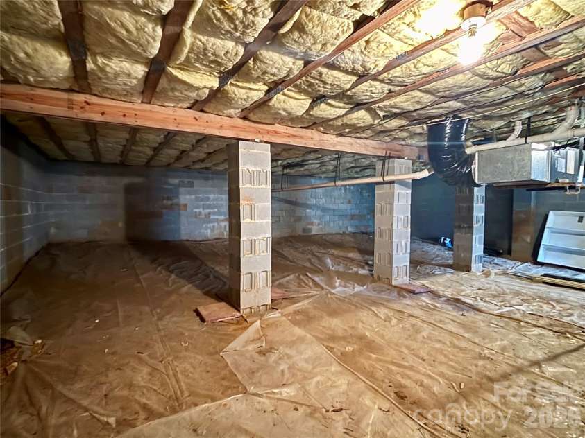 160 Whispering Pines Drive, Marion, NC 28752.  MLS# CAR4346254, YatesRealty ID 12995. Huge basement storage area!