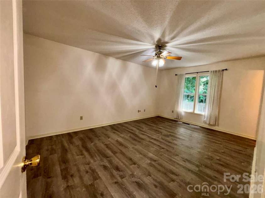 160 Whispering Pines Drive, Marion, NC 28752.  MLS# CAR4346254, YatesRealty ID 12995. Primary bedroom