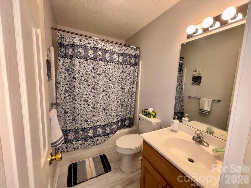 160 Whispering Pines Drive, Marion, NC 28752.  MLS# CAR4346254, YatesRealty ID 12995. Private deck