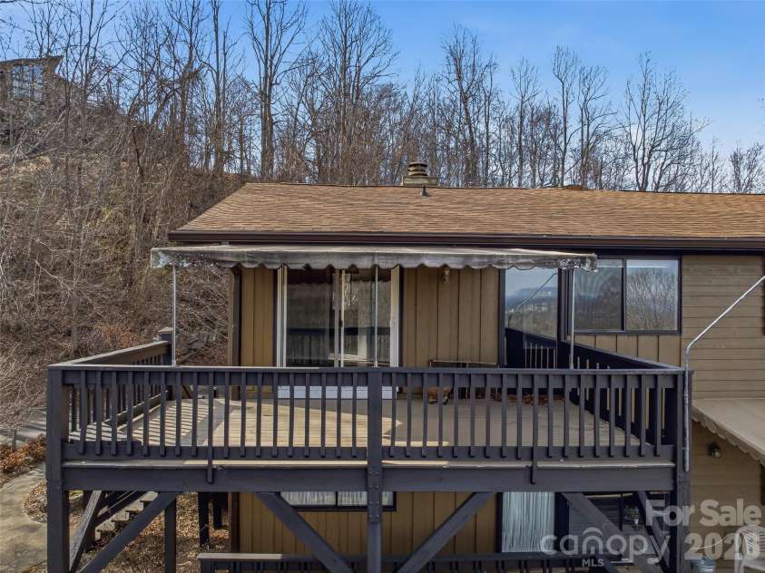 128 Country Ridge Road, Hendersonville, NC 28739.  MLS# CAR4359544, YatesRealty ID 12999. Back deck