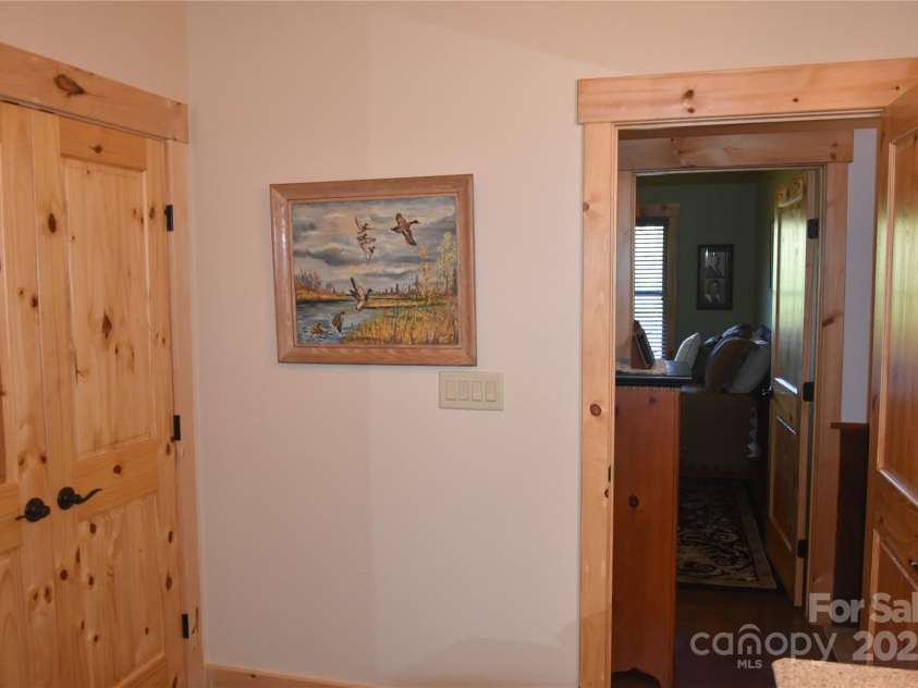 80 Grandview Loop, Nebo, NC 28761.  MLS# CAR4317495, YatesRealty ID 1300. Cabinets in the large full bath on the lower level.