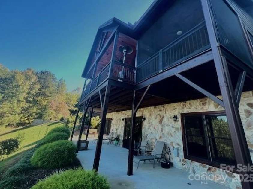 80 Grandview Loop, Nebo, NC 28761.  MLS# CAR4317495, YatesRealty ID 1300. View of lower level and patio under the main level deck.