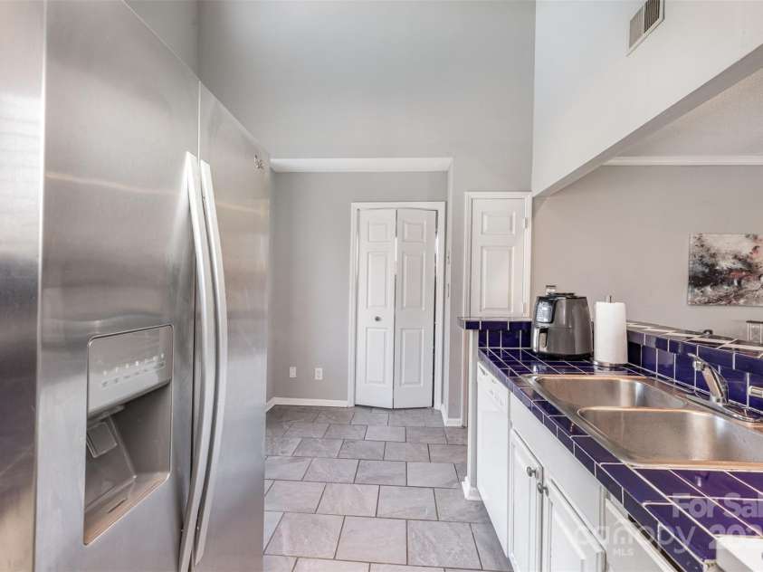 9035 J M Keynes Drive, Charlotte, NC 28262.  MLS# CAR4233077, YatesRealty ID 13005. 