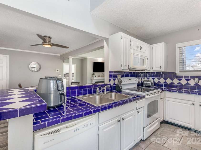 9035 J M Keynes Drive, Charlotte, NC 28262.  MLS# CAR4233077, YatesRealty ID 13005. 