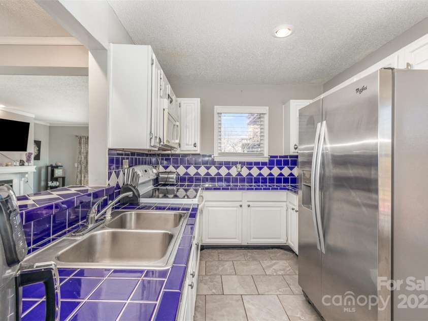 9035 J M Keynes Drive, Charlotte, NC 28262.  MLS# CAR4233077, YatesRealty ID 13005. 