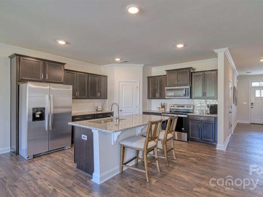 296 Creekview Road, Hendersonville, NC 28792.  MLS# CAR4176627, YatesRealty ID 13006. Kitchen with stainless appliances
