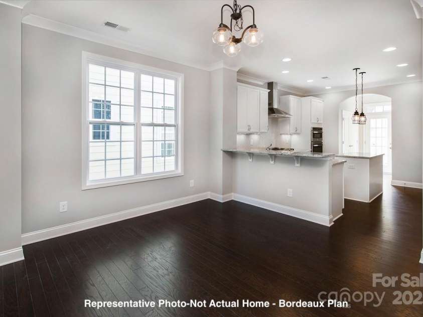 19732-B School Street, Cornelius, NC 28031.  MLS# CAR4235035, YatesRealty ID 13009. Dining to Kitchen-Bordeaux Plan