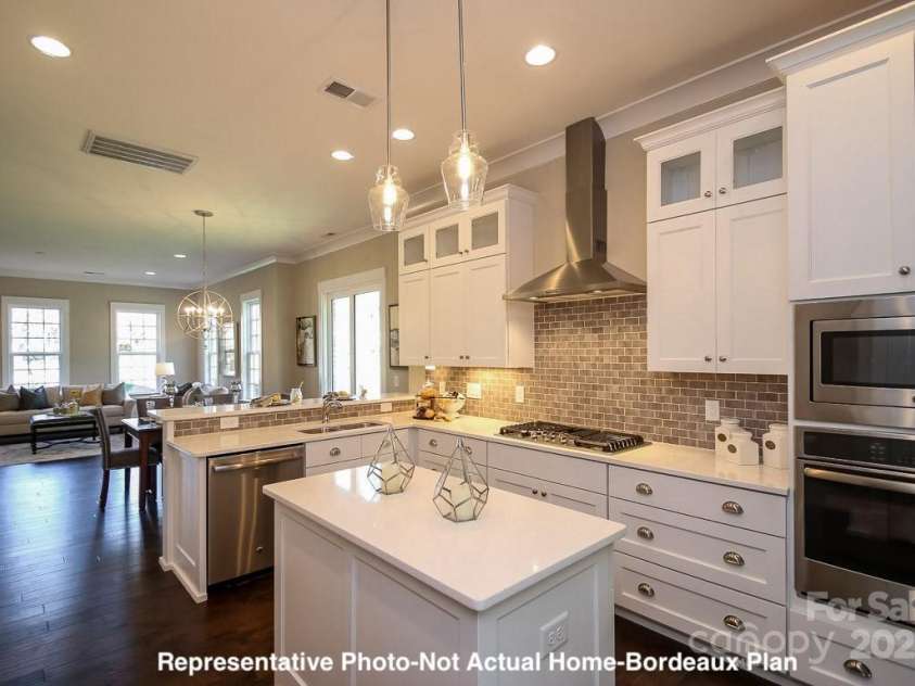 19732-B School Street, Cornelius, NC 28031.  MLS# CAR4235035, YatesRealty ID 13009. Kitchen to Living-Bordeaux Plan