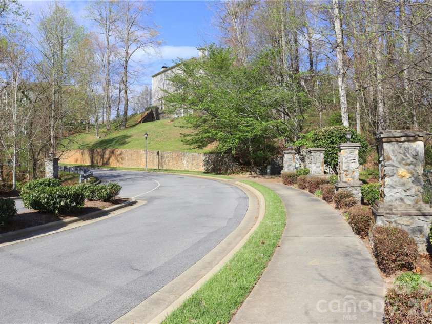 700 Vista Lake Drive, Candler, NC 28715.  MLS# CAR4365979, YatesRealty ID 13009. Sidewalks throughout 