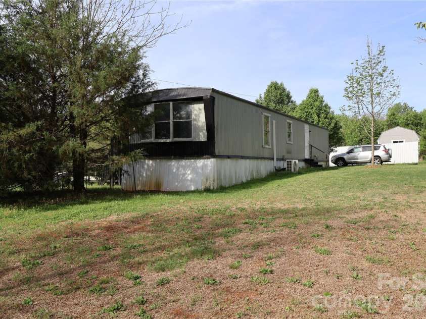 126 Cedarvale Drive, Harmony, NC 28634.  MLS# CAR4366262, YatesRealty ID 13010. 
