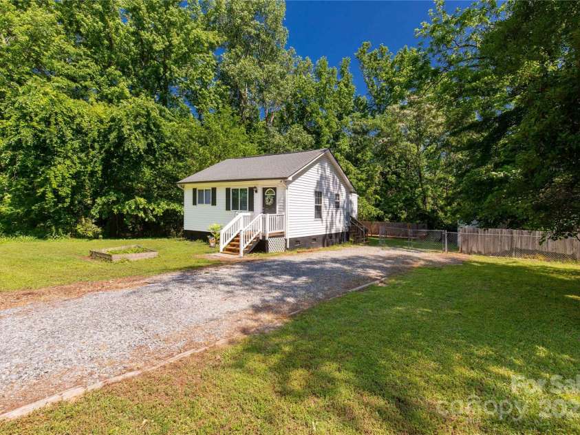 201 Trinity Street, Clover, SC 29710.  MLS# CAR4253318, YatesRealty ID 13011. Gravel Driveway