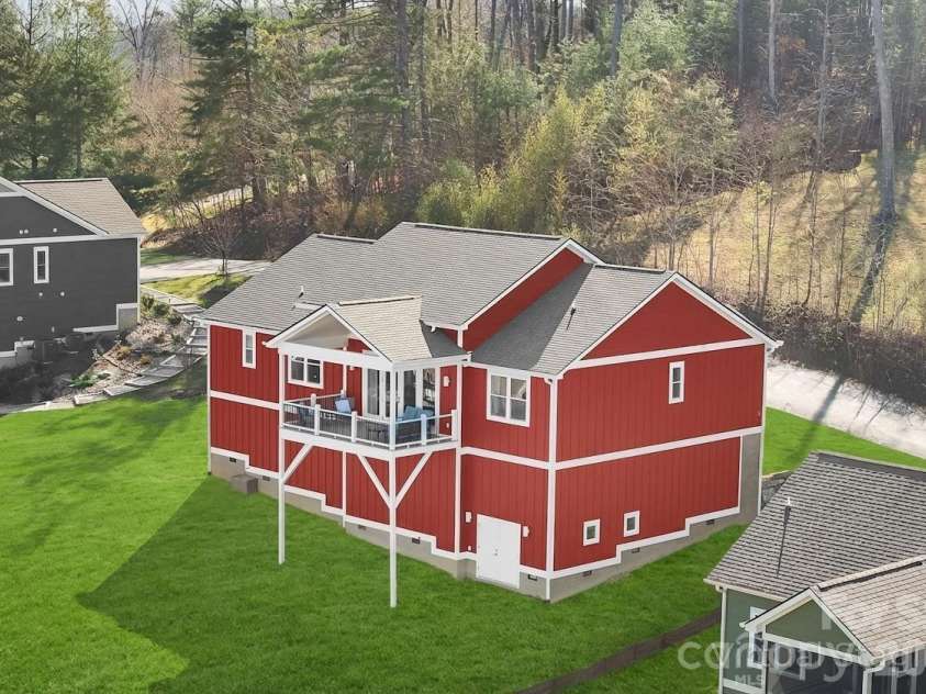 68 Carrie Drive, Hendersonville, NC 28792.  MLS# CAR4361651, YatesRealty ID 13011. Green grass is virtually enhanced