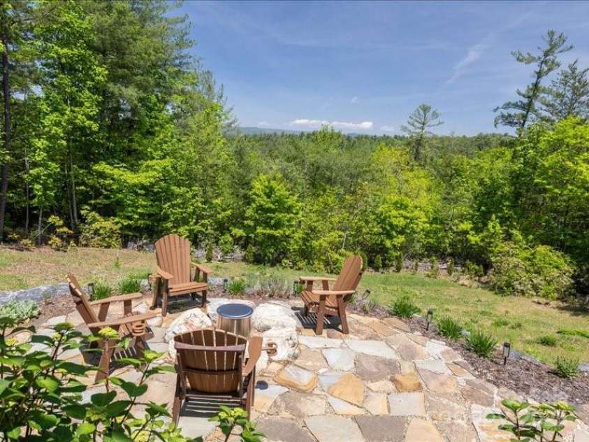 2054 Catawba Trail, Nebo, NC 28761.  MLS# CAR4255787, YatesRealty ID 13014. Backyard Fire Pit Area