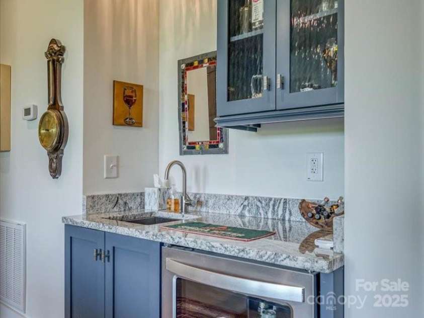 2054 Catawba Trail, Nebo, NC 28761.  MLS# CAR4255787, YatesRealty ID 13014. Downstairs Den & Wet Bar