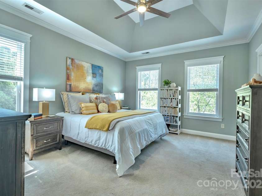 7409 Gilderstern Glen Court, Huntersville, NC 28078.  MLS# CAR4249870, YatesRealty ID 13015. Primary Suite with tray ceiling and a lot of light.
