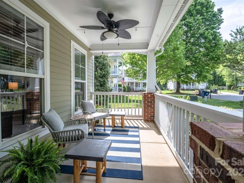 7409 Gilderstern Glen Court, Huntersville, NC 28078.  MLS# CAR4249870, YatesRealty ID 13015. Rocking Chair covered porch