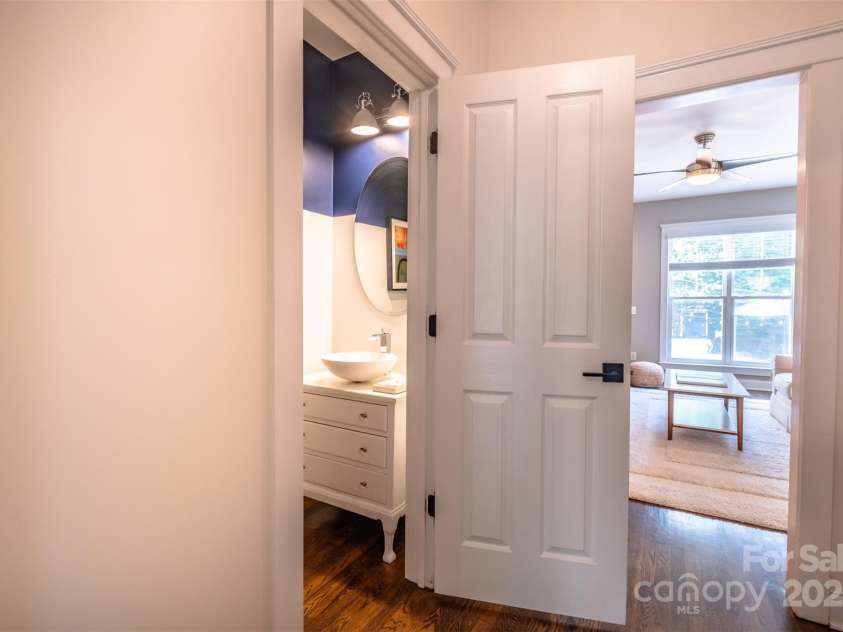 7409 Gilderstern Glen Court, Huntersville, NC 28078.  MLS# CAR4249870, YatesRealty ID 13015. The downstairs powder room