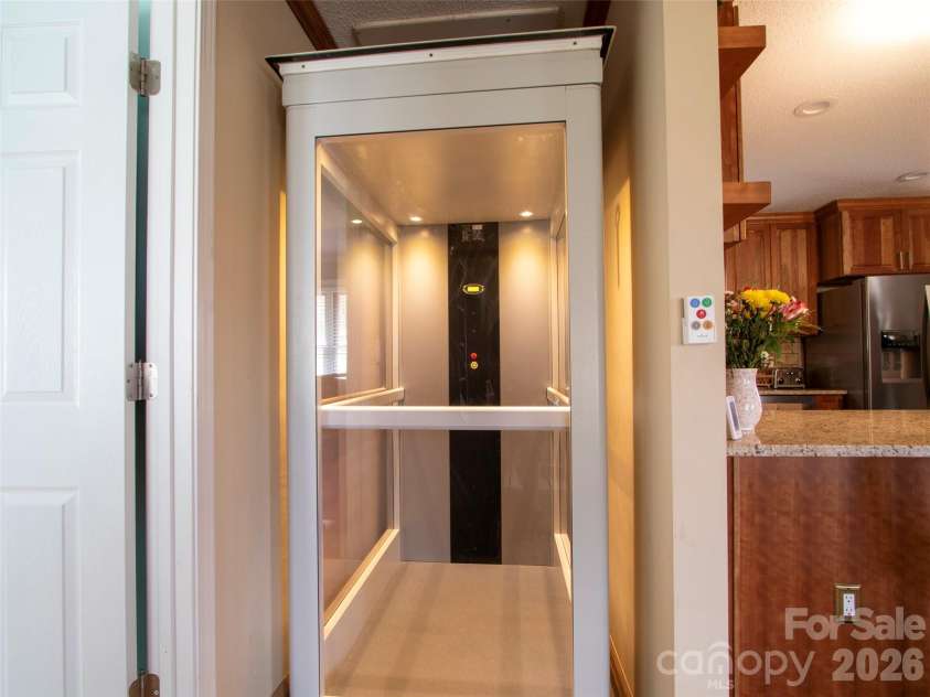 342 Mountain View Road, Burnsville, NC 28714.  MLS# CAR4347240, YatesRealty ID 13028. Full size Elevator~