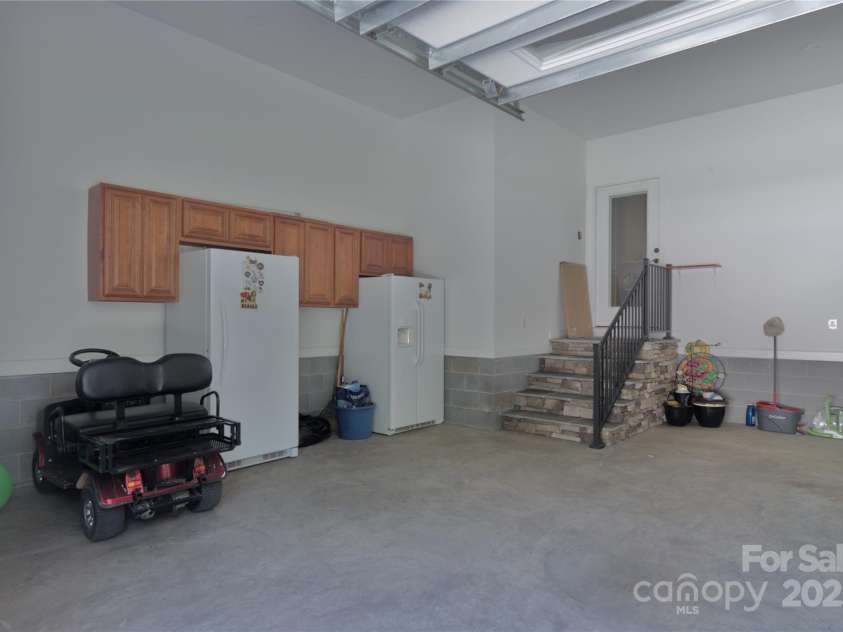 15027 Beatties Ford Road, Huntersville, NC 28078.  MLS# CAR4308450, YatesRealty ID 1303. 2 car attached garage