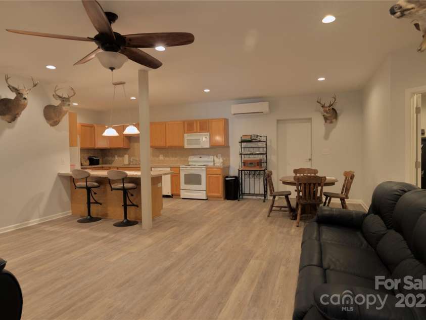 15027 Beatties Ford Road, Huntersville, NC 28078.  MLS# CAR4308450, YatesRealty ID 1303. 2nd living quarters attached to building