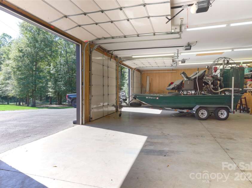 15027 Beatties Ford Road, Huntersville, NC 28078.  MLS# CAR4308450, YatesRealty ID 1303. 5 car detached garage