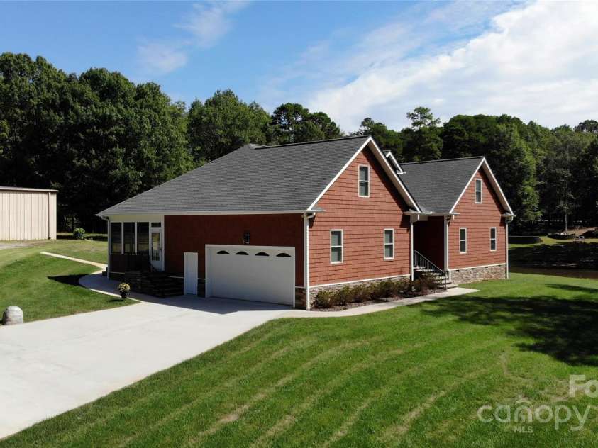 15027 Beatties Ford Road, Huntersville, NC 28078.  MLS# CAR4308450, YatesRealty ID 1303. 