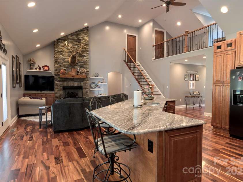 15027 Beatties Ford Road, Huntersville, NC 28078.  MLS# CAR4308450, YatesRealty ID 1303. Kitchen open to living room