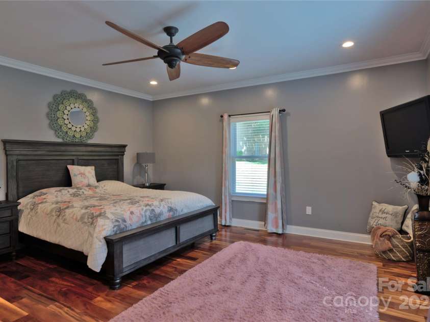 15027 Beatties Ford Road, Huntersville, NC 28078.  MLS# CAR4308450, YatesRealty ID 1303. Primary bedroom