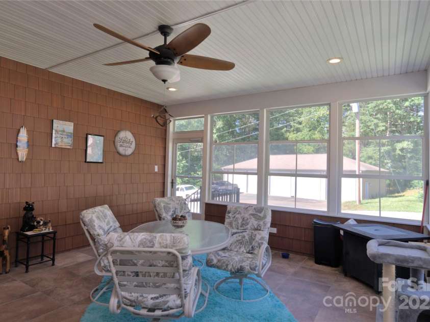 15027 Beatties Ford Road, Huntersville, NC 28078.  MLS# CAR4308450, YatesRealty ID 1303. Screened porch