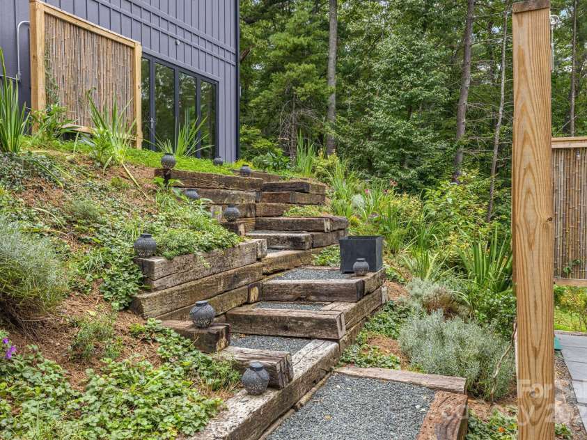 47 Webb Cove Road, Asheville, NC 28804.  MLS# CAR4234951, YatesRealty ID 13033. Enjoy the walk through mature landscaping to the front entrance