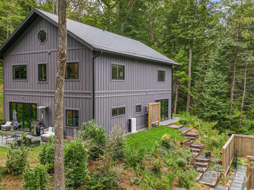 47 Webb Cove Road, Asheville, NC 28804.  MLS# CAR4234951, YatesRealty ID 13033. Modern Luxury Net Zero Home sits on a knoll overlooking Beaverdam Valley!