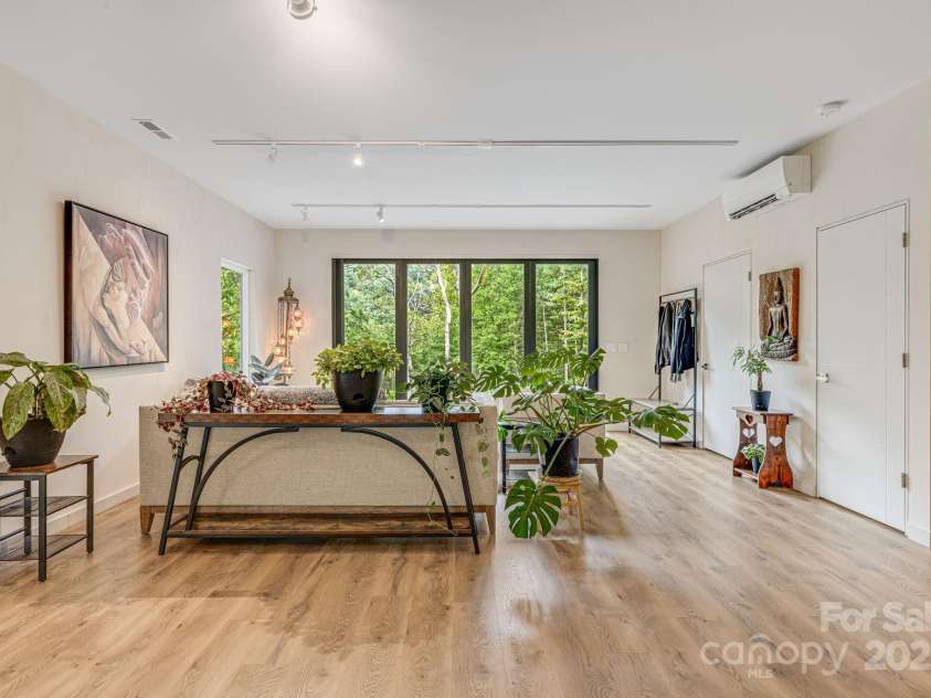 47 Webb Cove Road, Asheville, NC 28804.  MLS# CAR4234951, YatesRealty ID 13033. View of main living area from the dining area