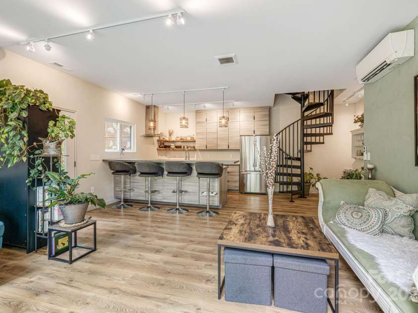 47 Webb Cove Road, Asheville, NC 28804.  MLS# CAR4234951, YatesRealty ID 13033. View of open floor plan for second living area