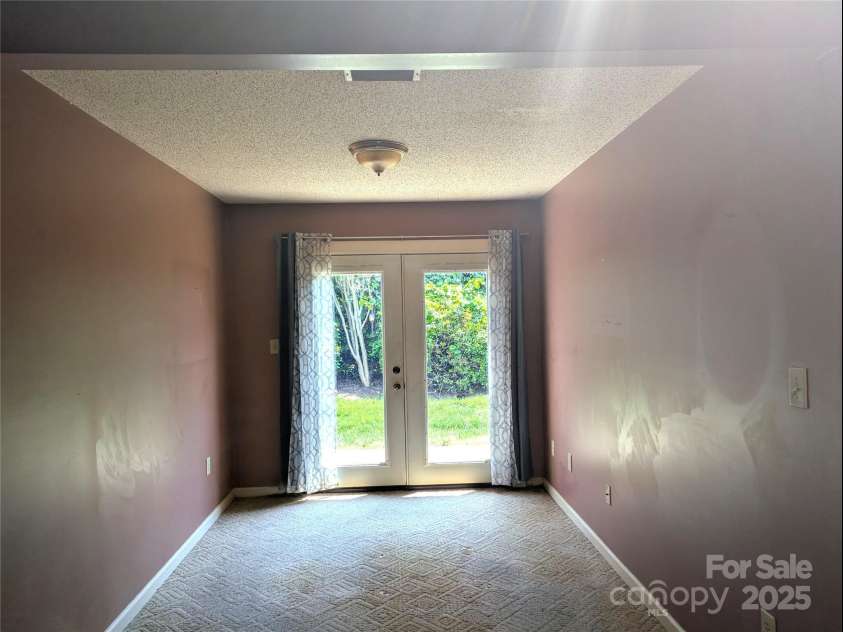 711 4th Avenue, Conover, NC 28613.  MLS# CAR4253226, YatesRealty ID 13036. Main Living area to back Patio