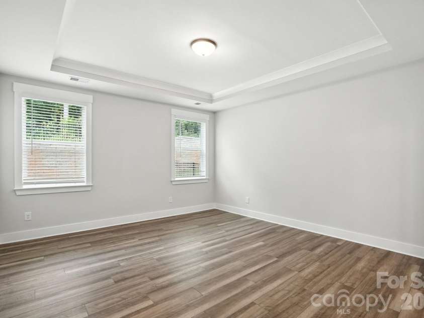 138 Prestwick Way, Mooresville, NC 28115.  MLS# CAR4285533, YatesRealty ID 13039. Primary bedroom